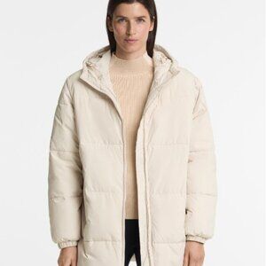 Medium Cream/Oatmeal Water-repellent PrimaLoft® padded midi jacket